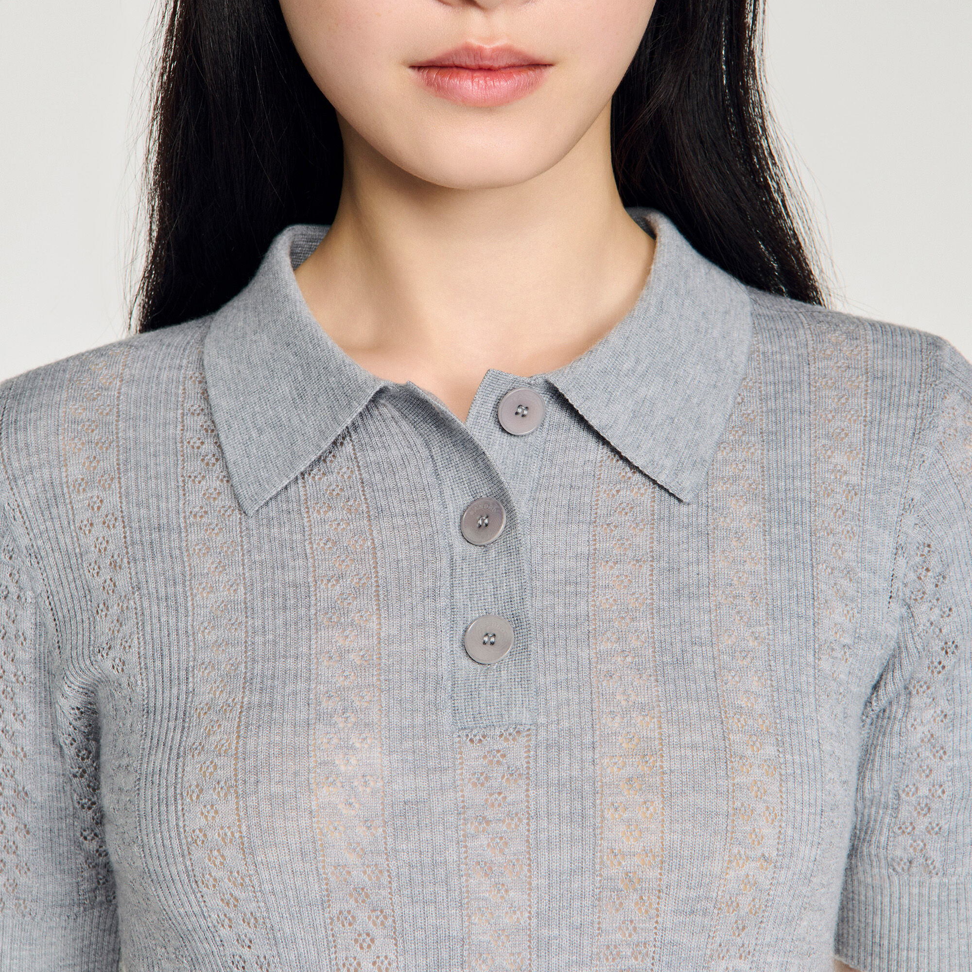 Pullover in lana con collo a polo pointelle
