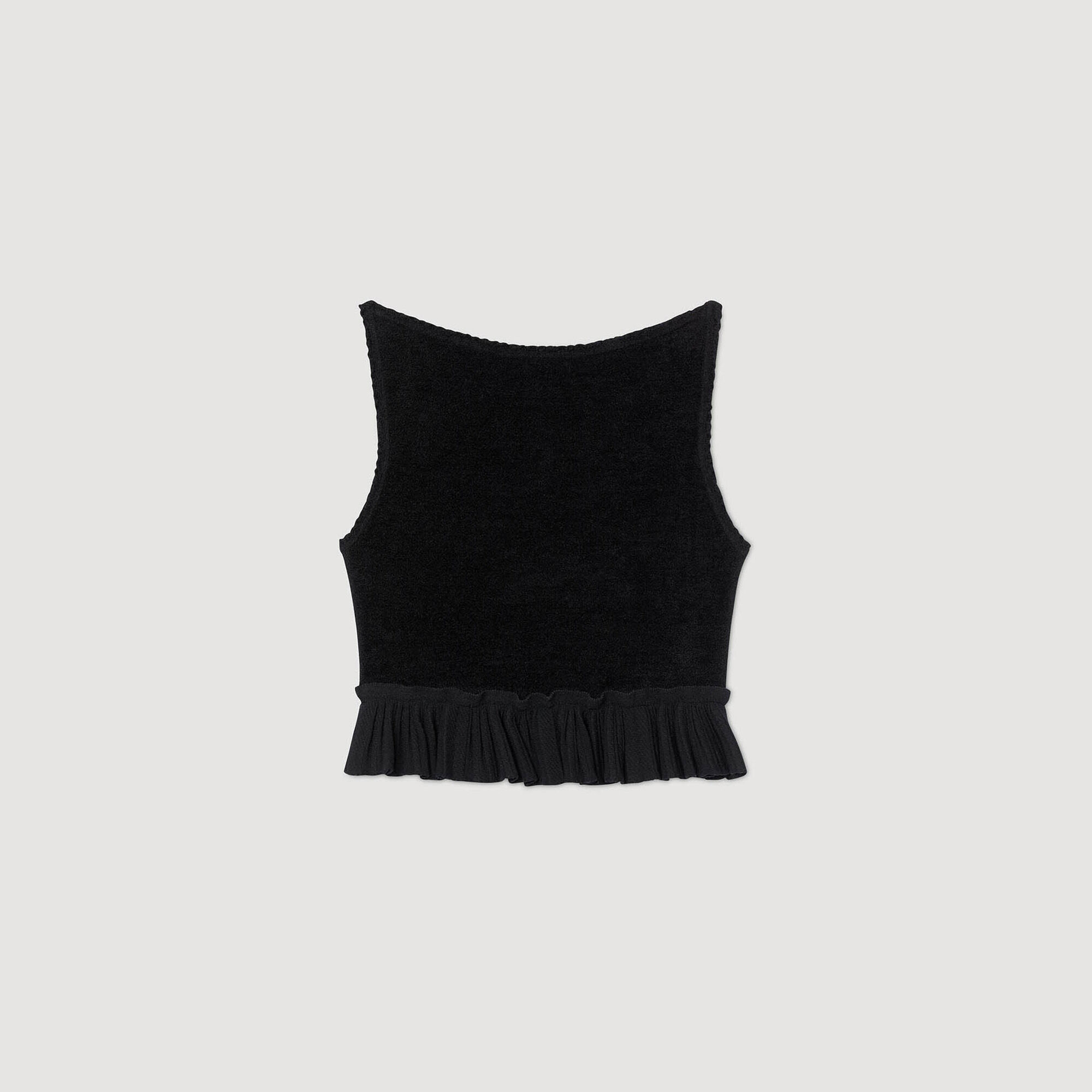 Top corto a maglia con volant