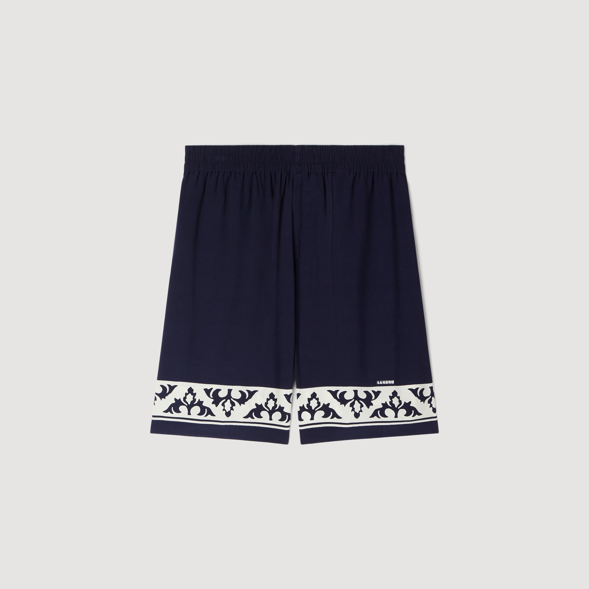 Pantaloni corti a contrasto con stampa fluide