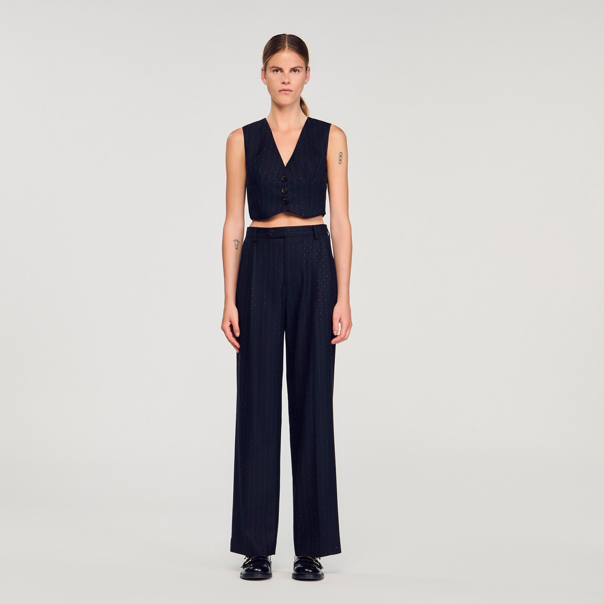 Gilet con strass a righe