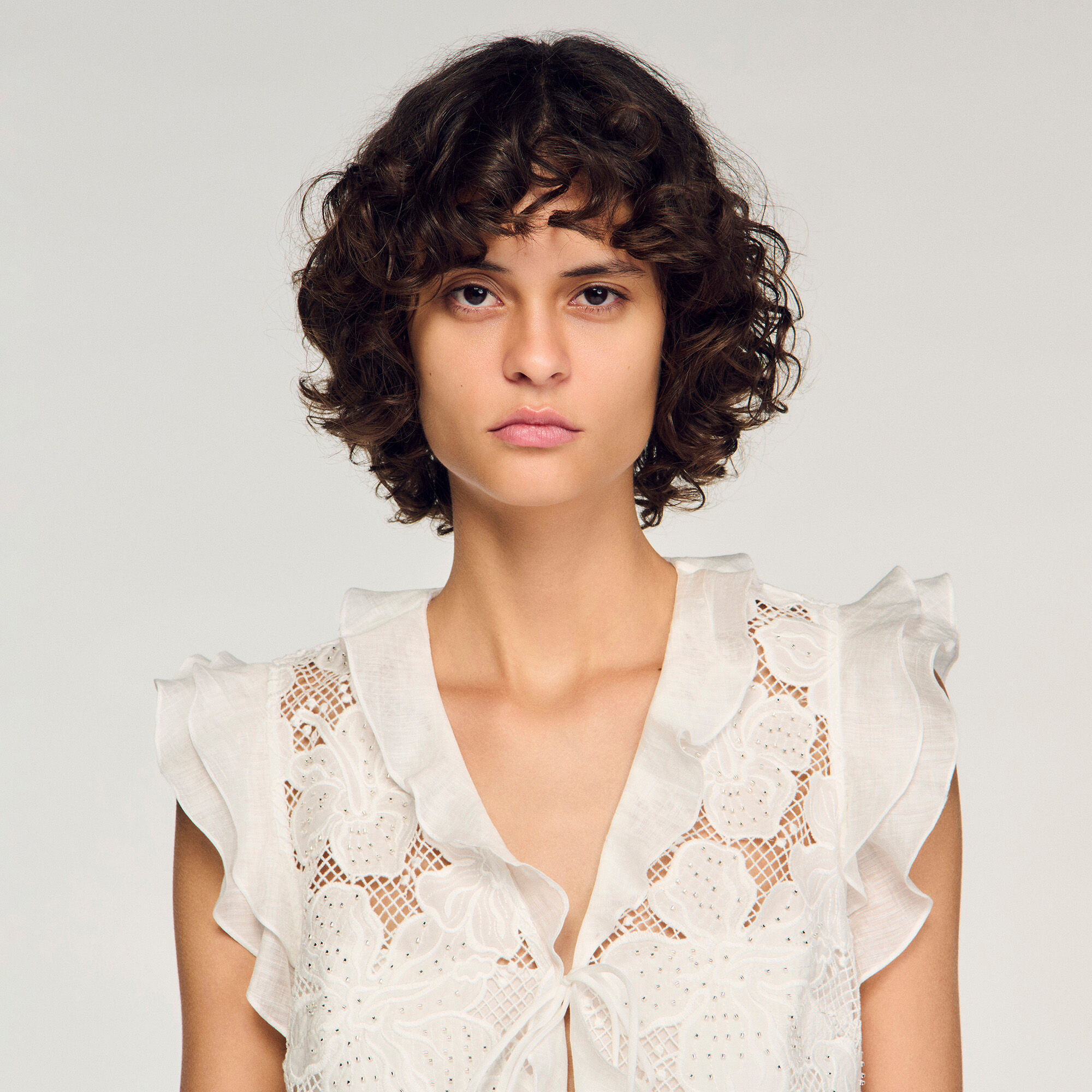Top corto in pizzo guipure