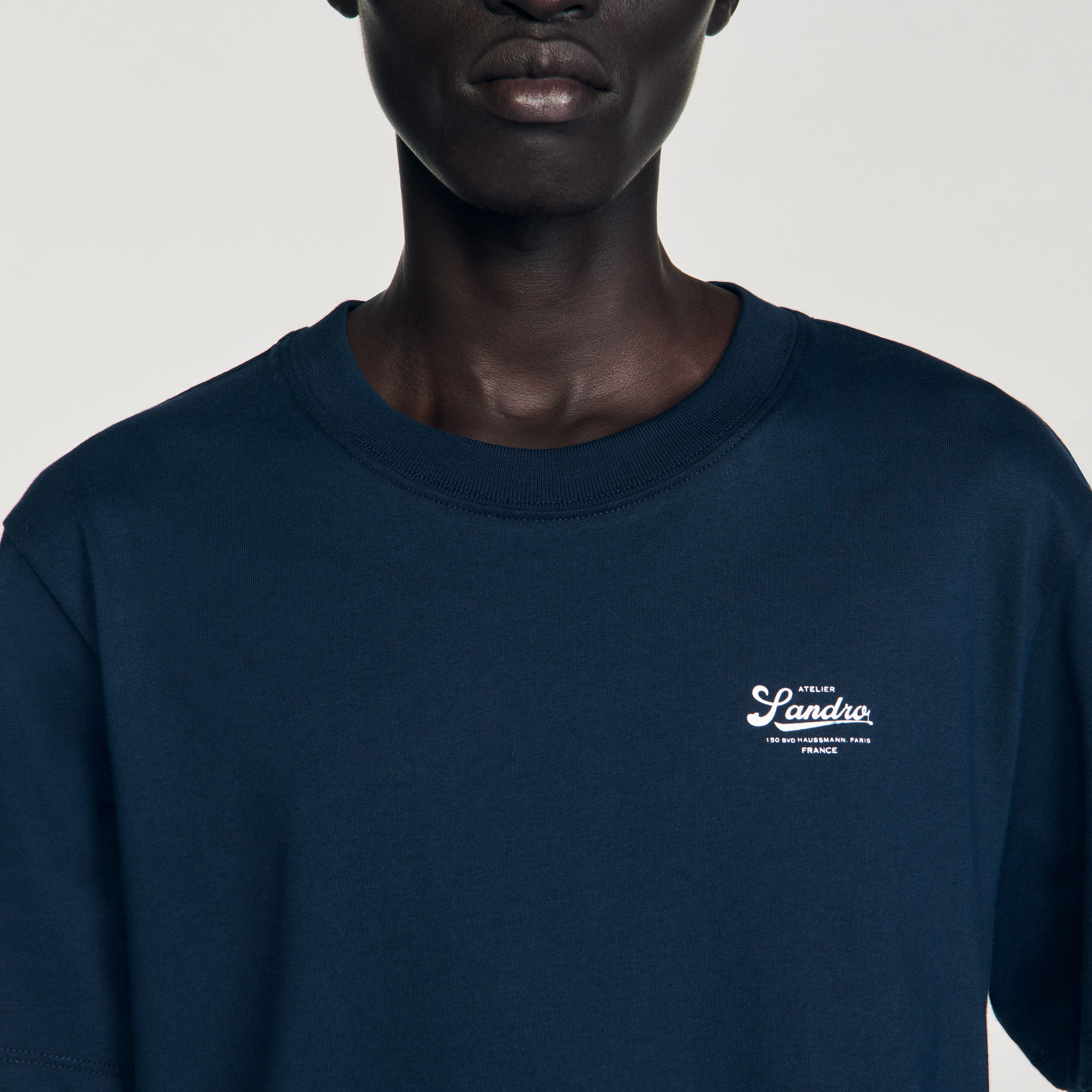 T-shirt con logo applicato