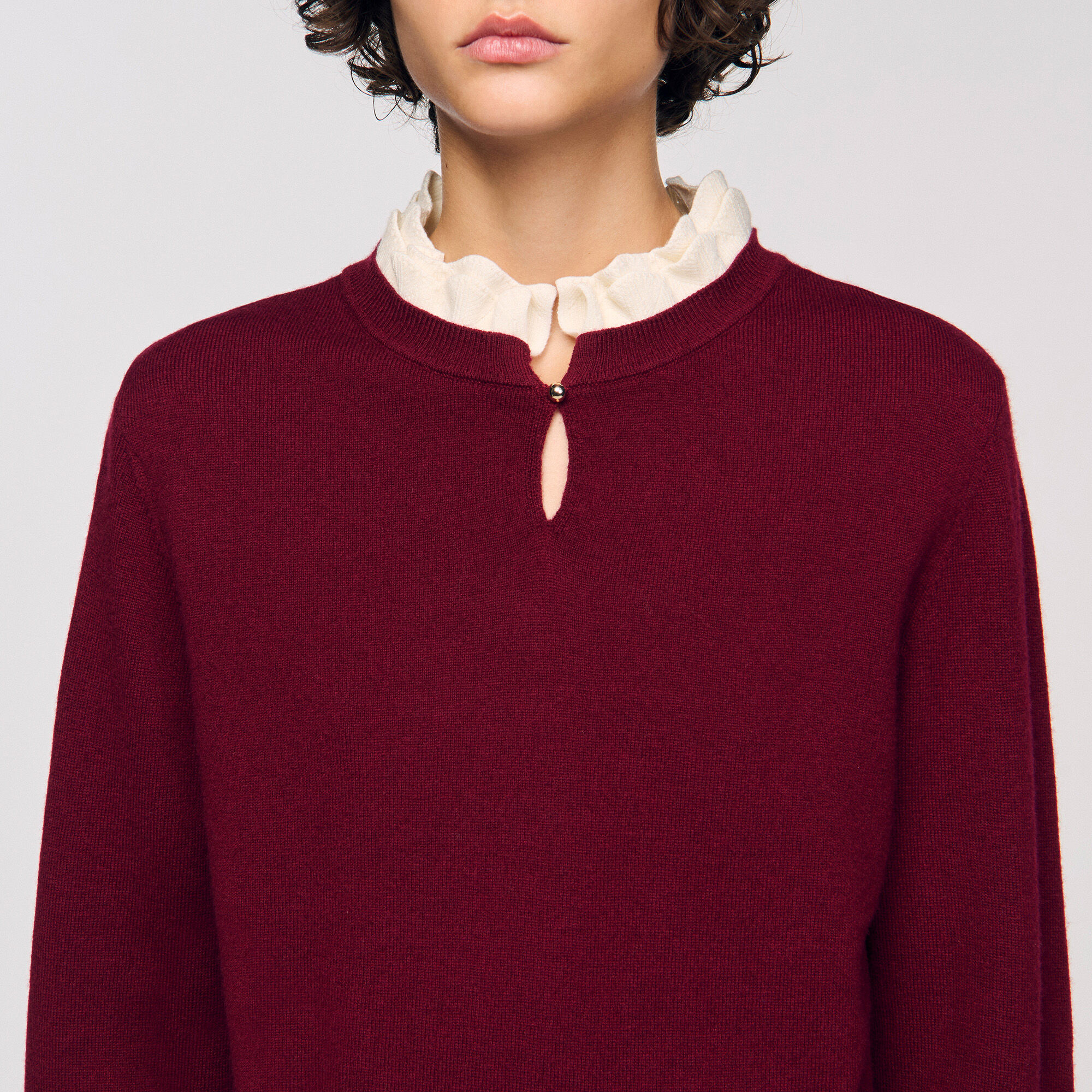 Maglione con colletto a volant