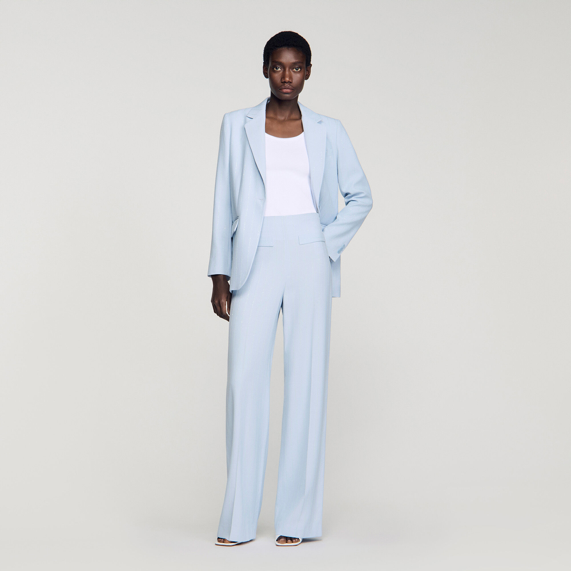 Pantaloni con paillettes a righe