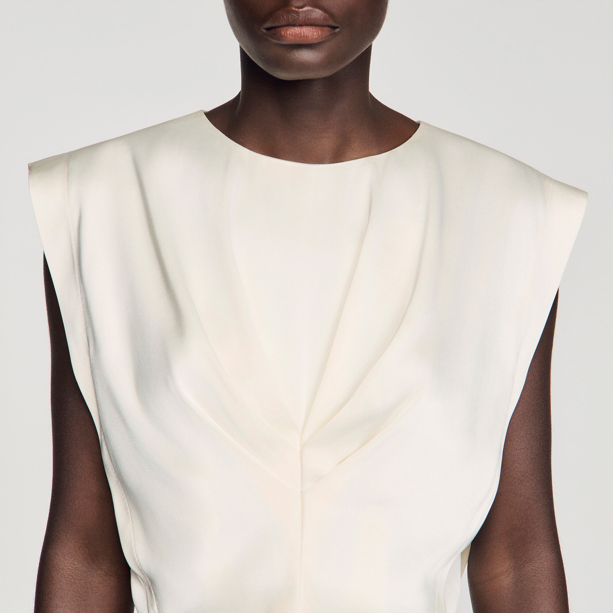 Top corto in satin a pieghe