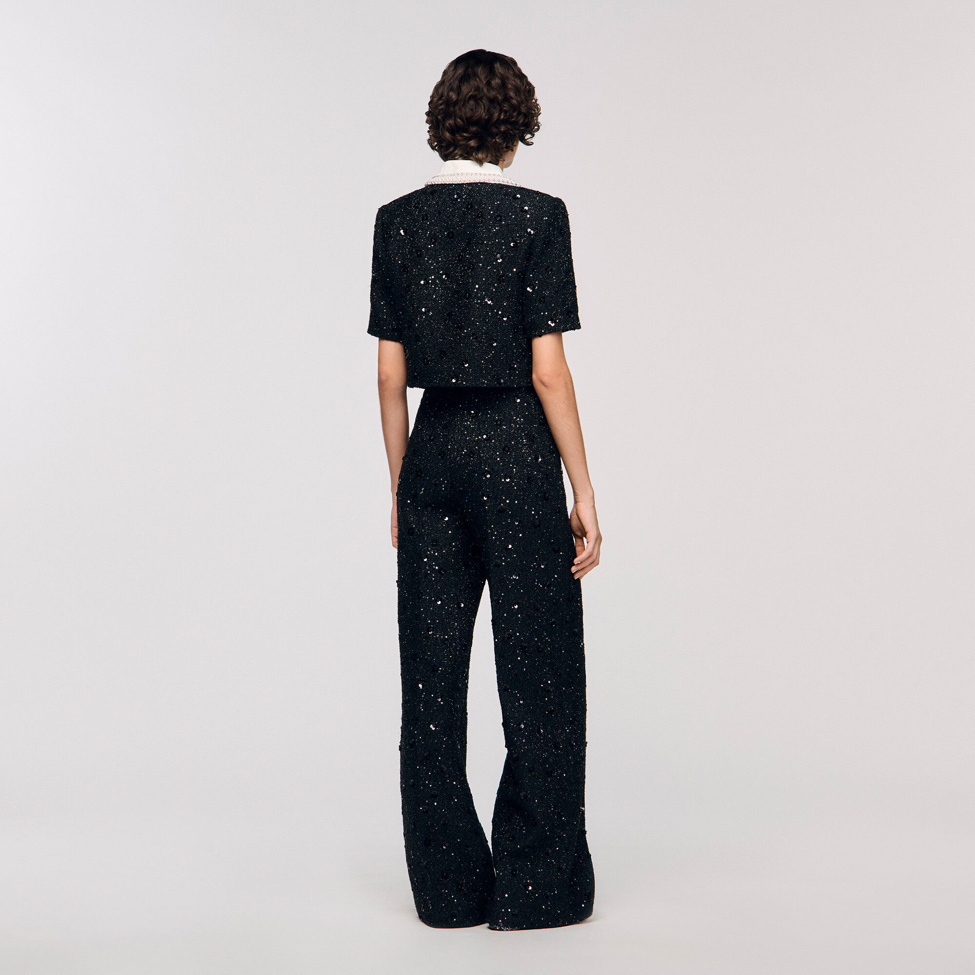 Pantaloni in tessuto tweed con strass
