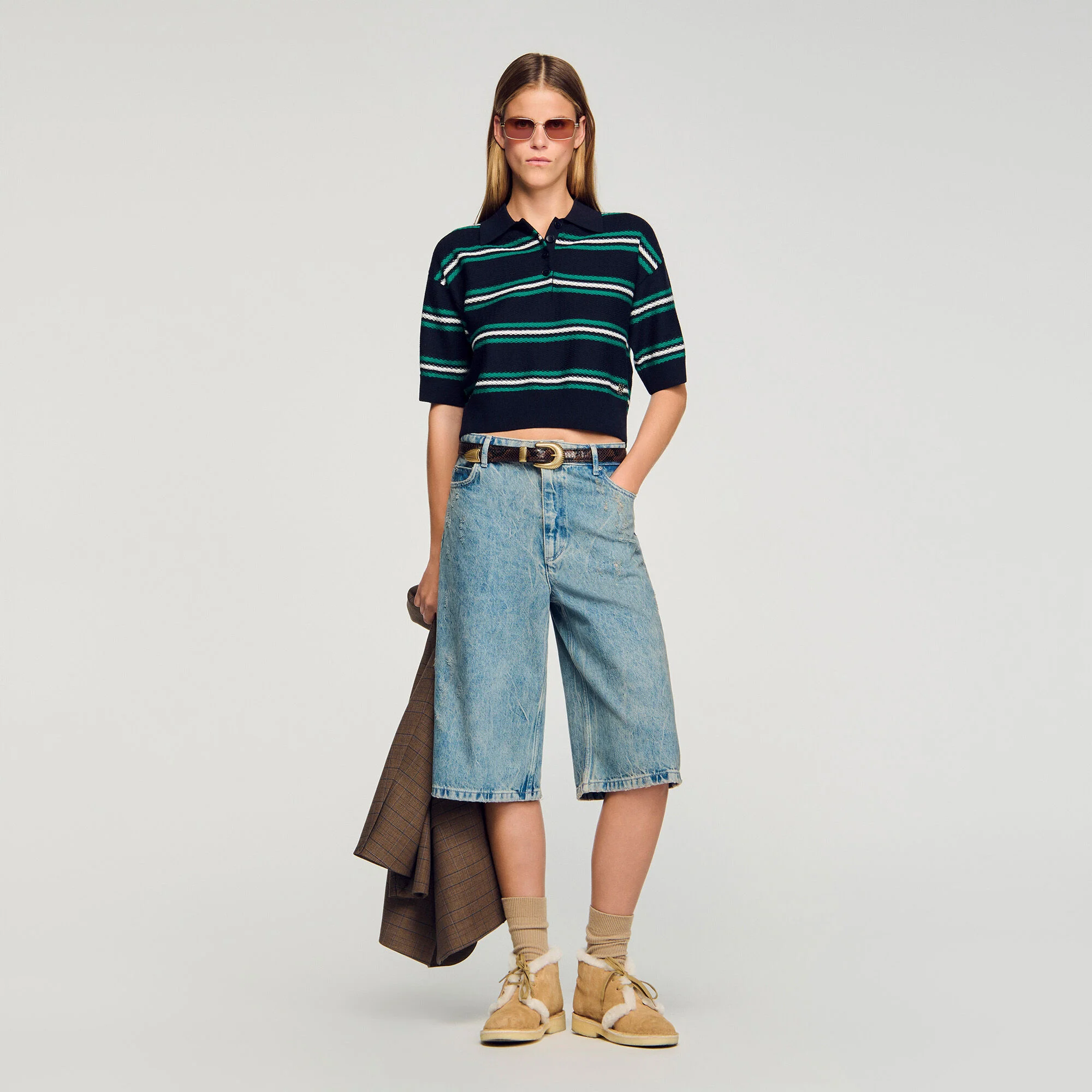 Pullover a collo di polo con righe