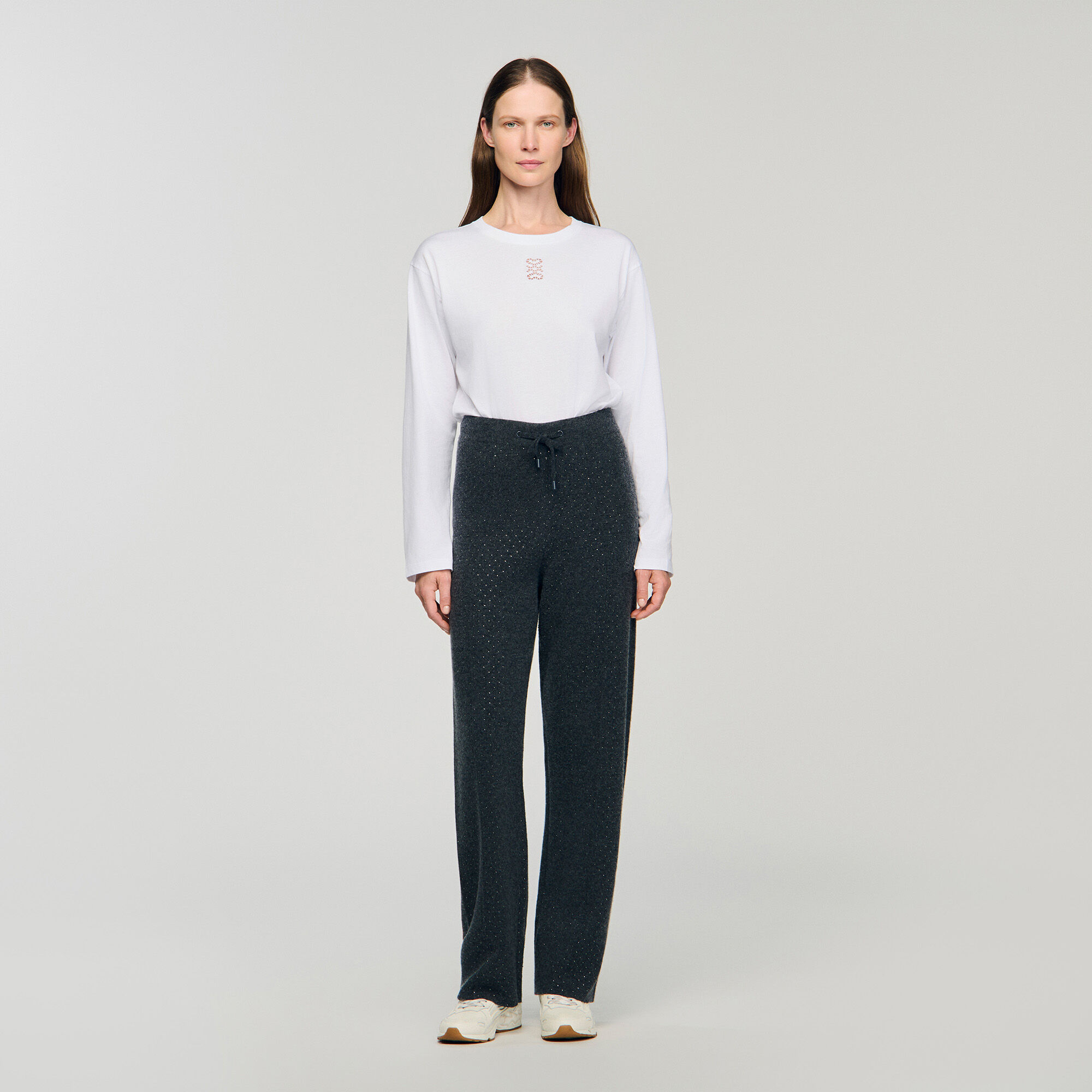 Pantaloni in maglina coperti di strass
