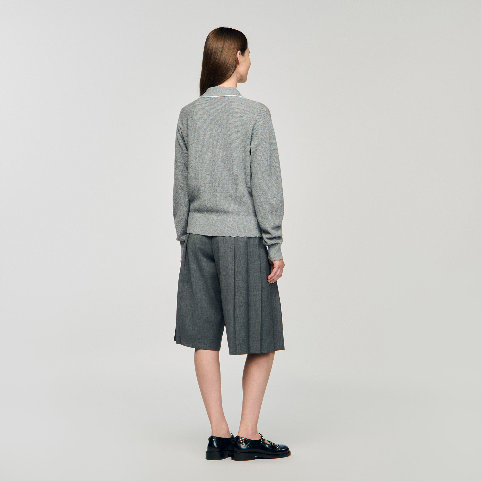 Pullover con collo a polo aperto