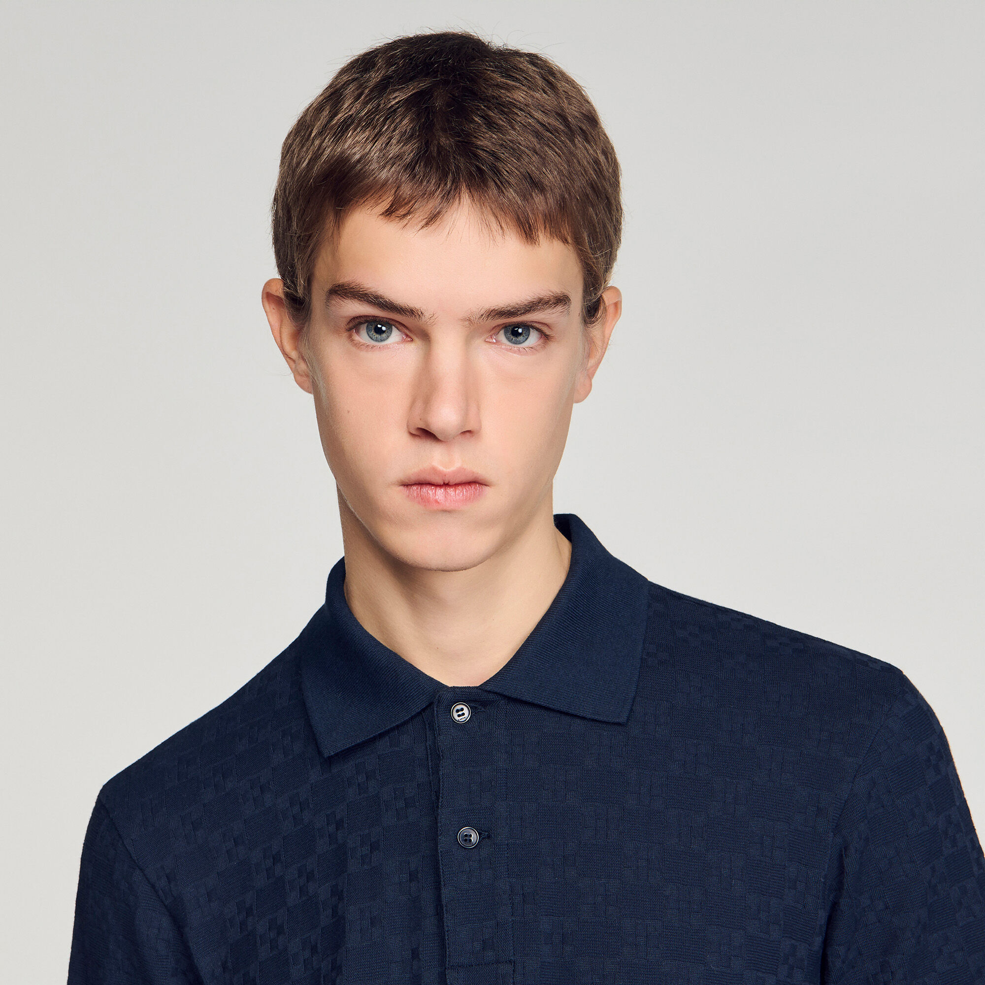 Polo jacquard con croce quadrata
