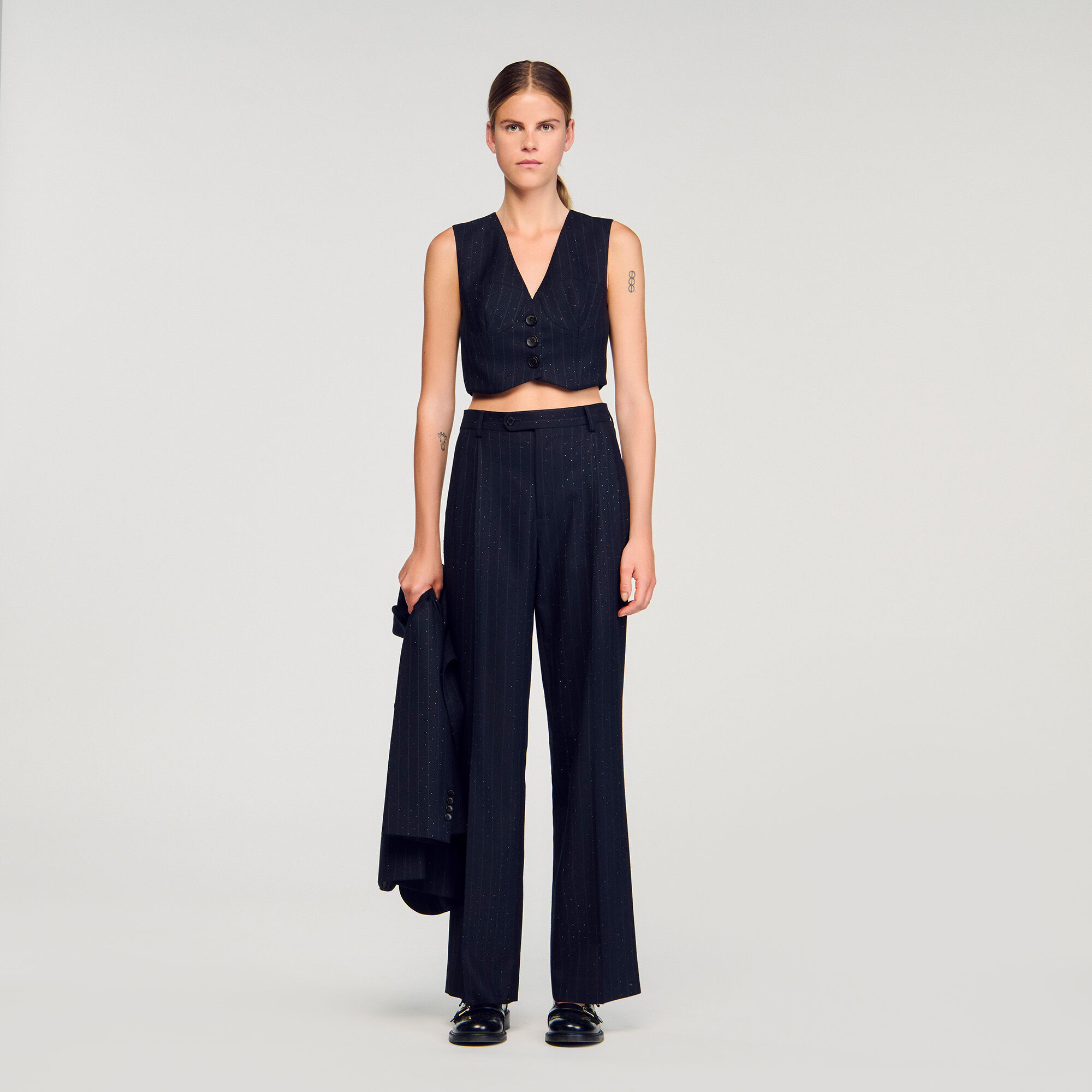 Gilet con strass a righe