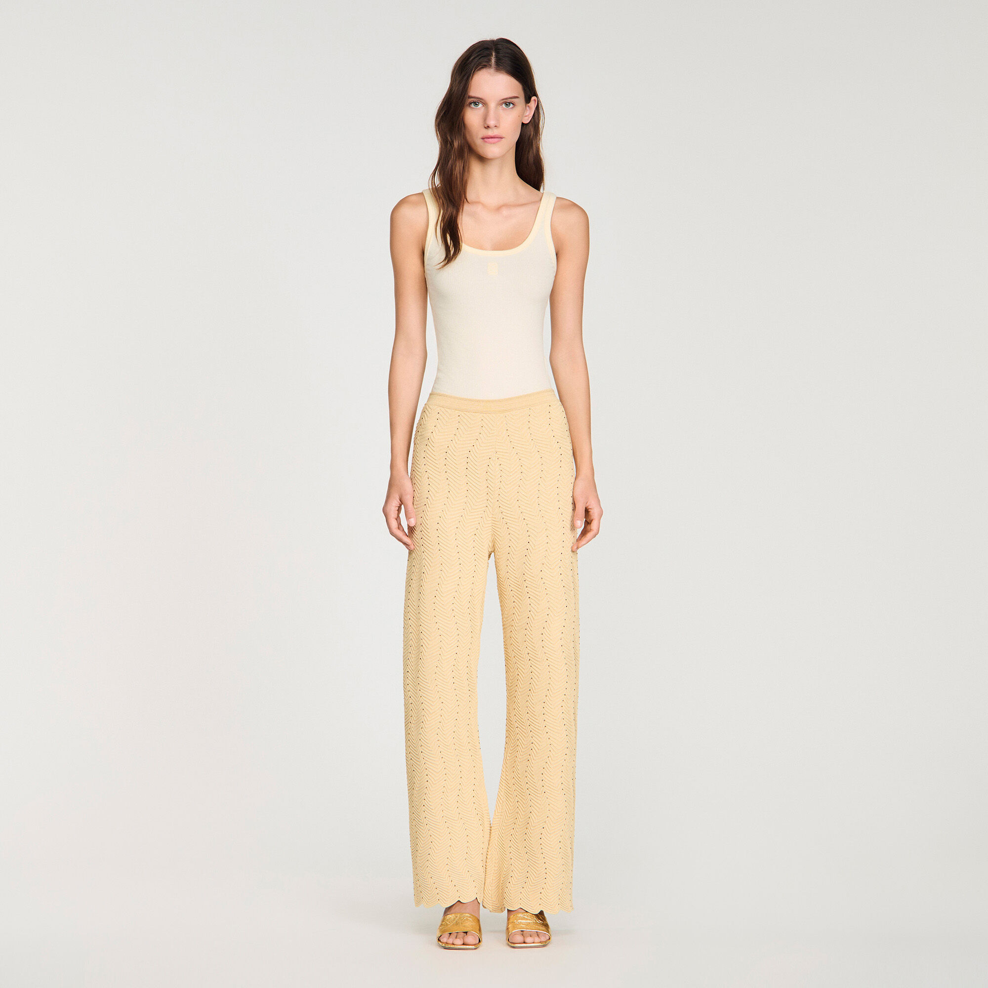 Pantaloni in maglia con strass