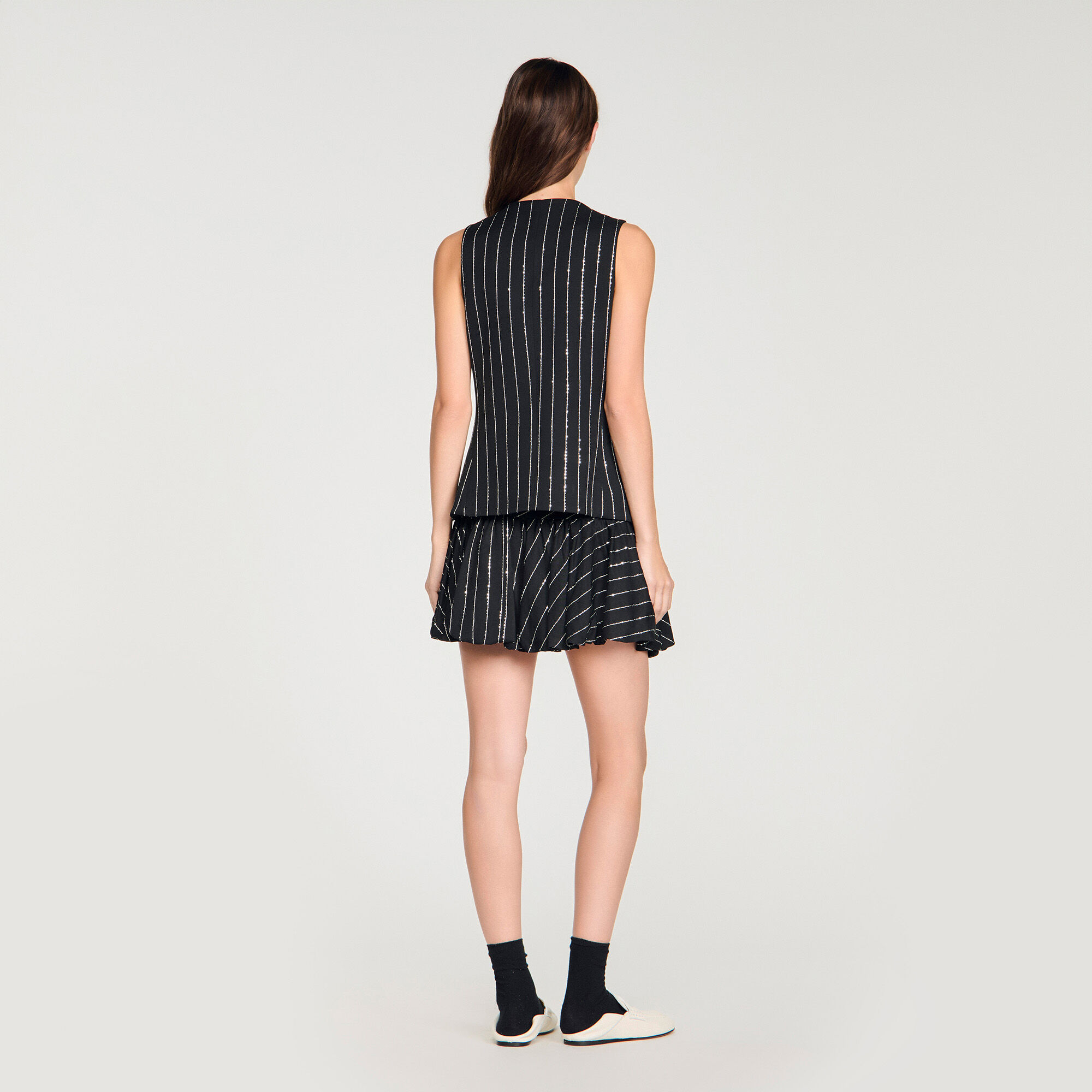 Vestito con strisce e brillantini