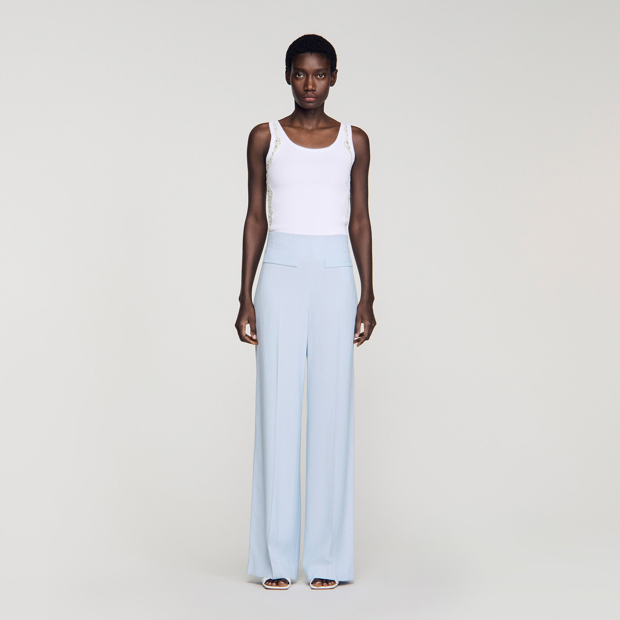 Pantaloni con paillettes a righe