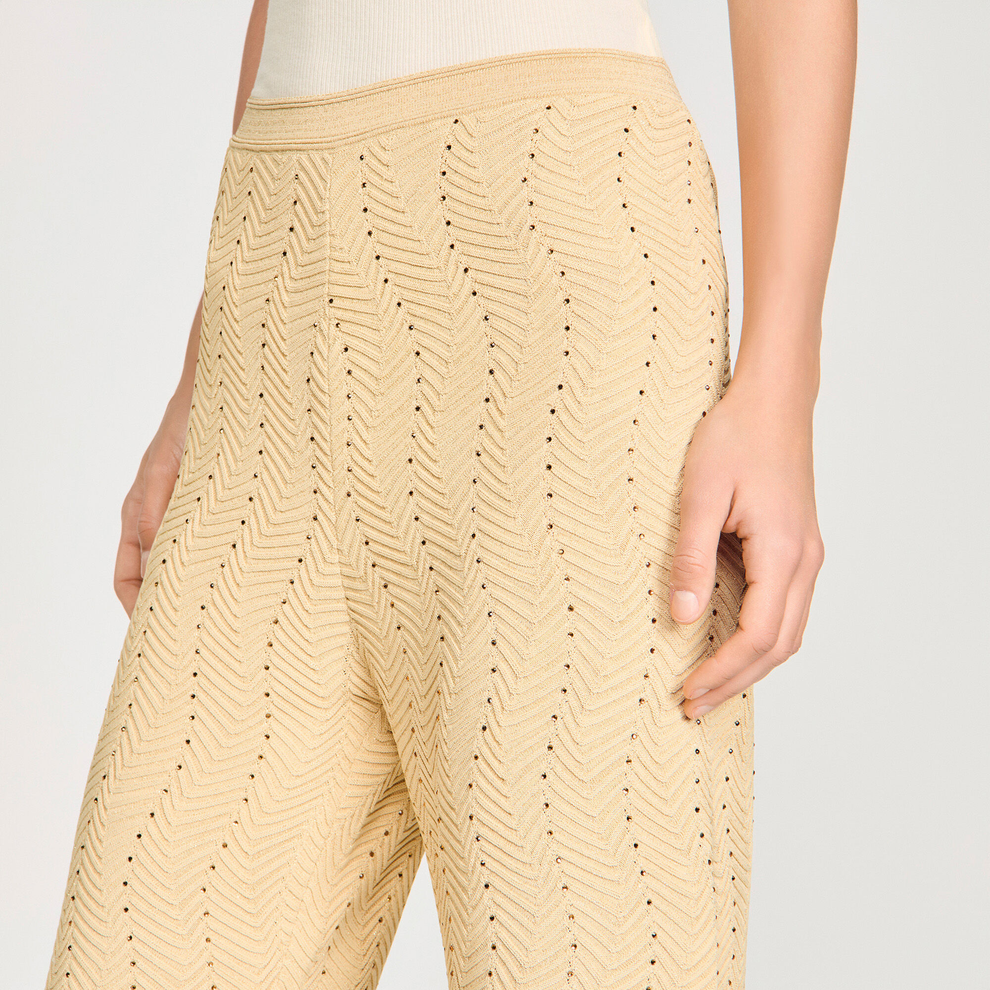Pantaloni in maglia con strass