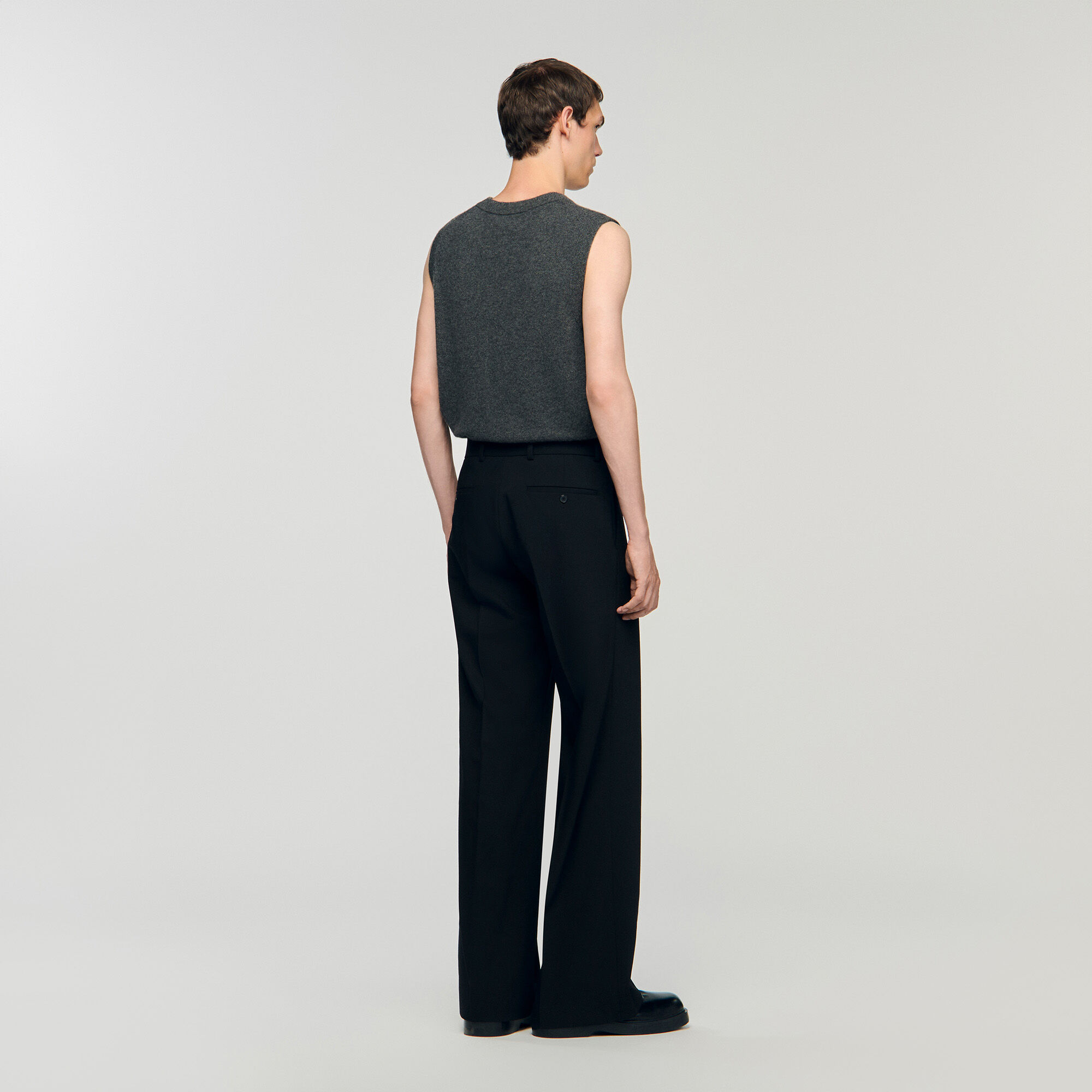 Pantaloni a gamba larga con pieghe