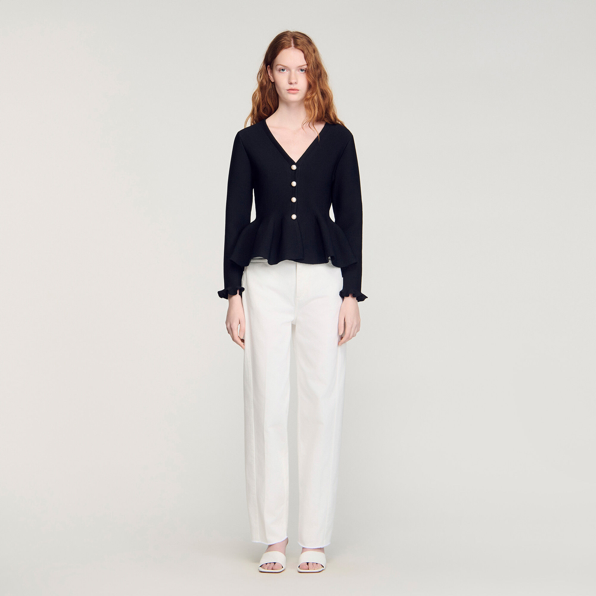 Cardigan con peplum