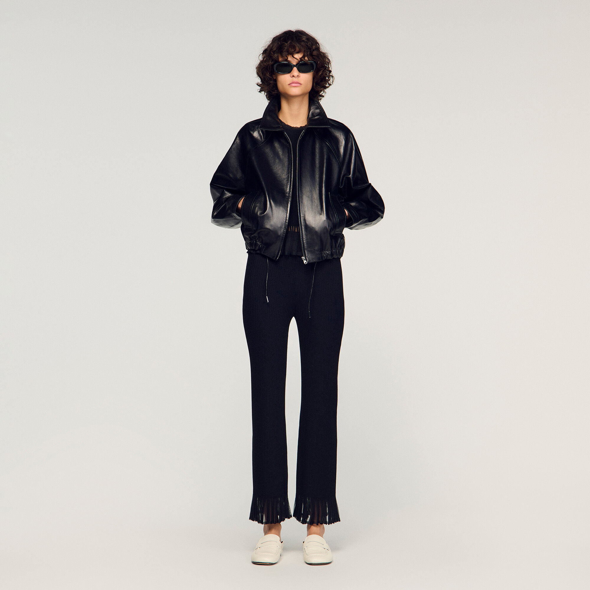 Pantaloni in maglia con volant