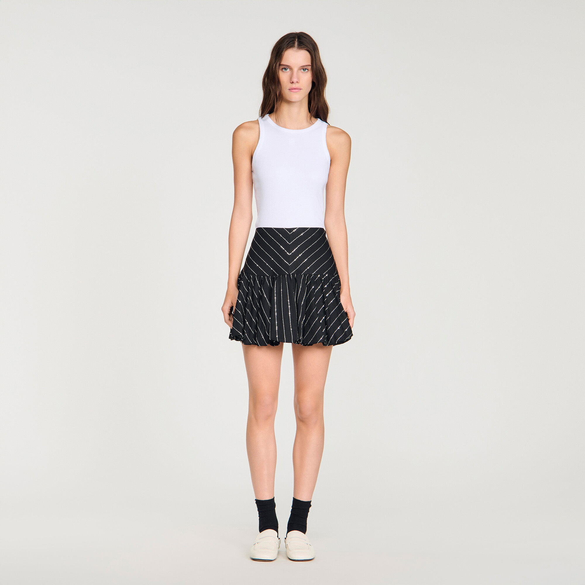 Mini gonna con strisce di brillantini