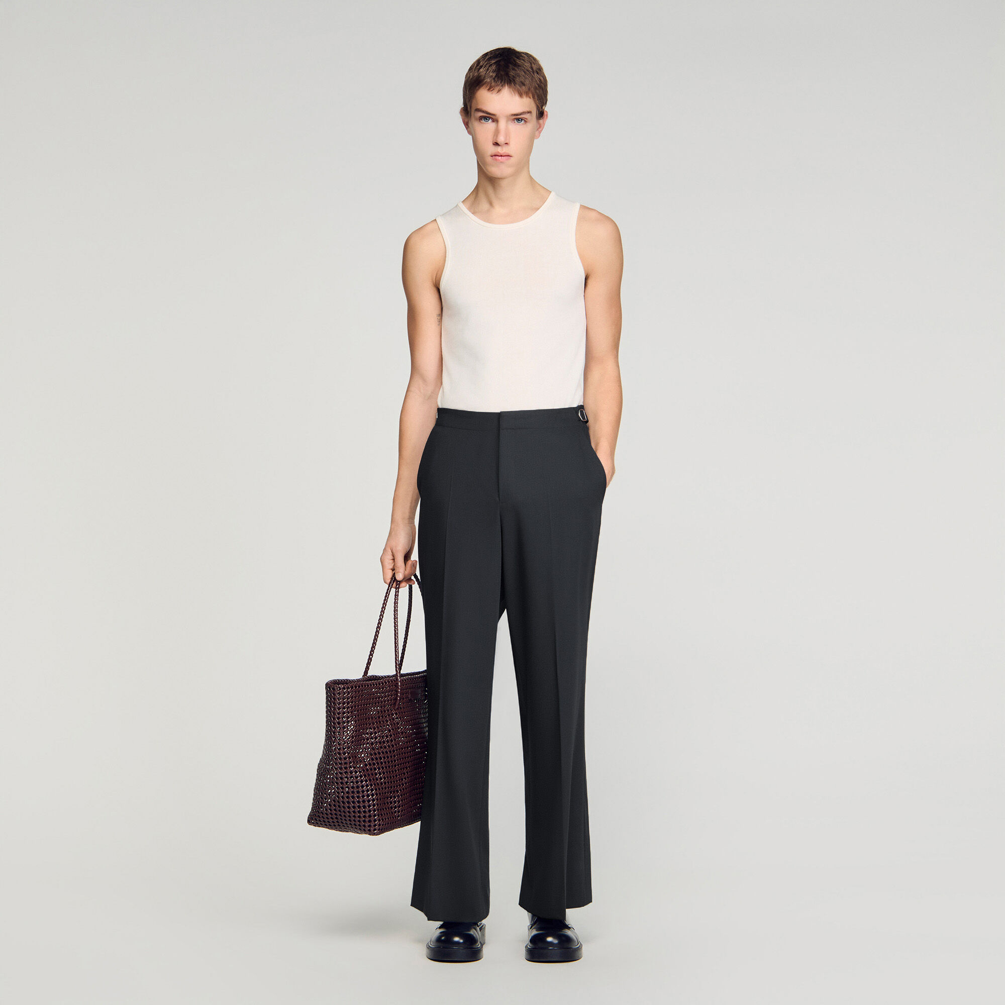 Pantaloni larghi in lana con fibbie
