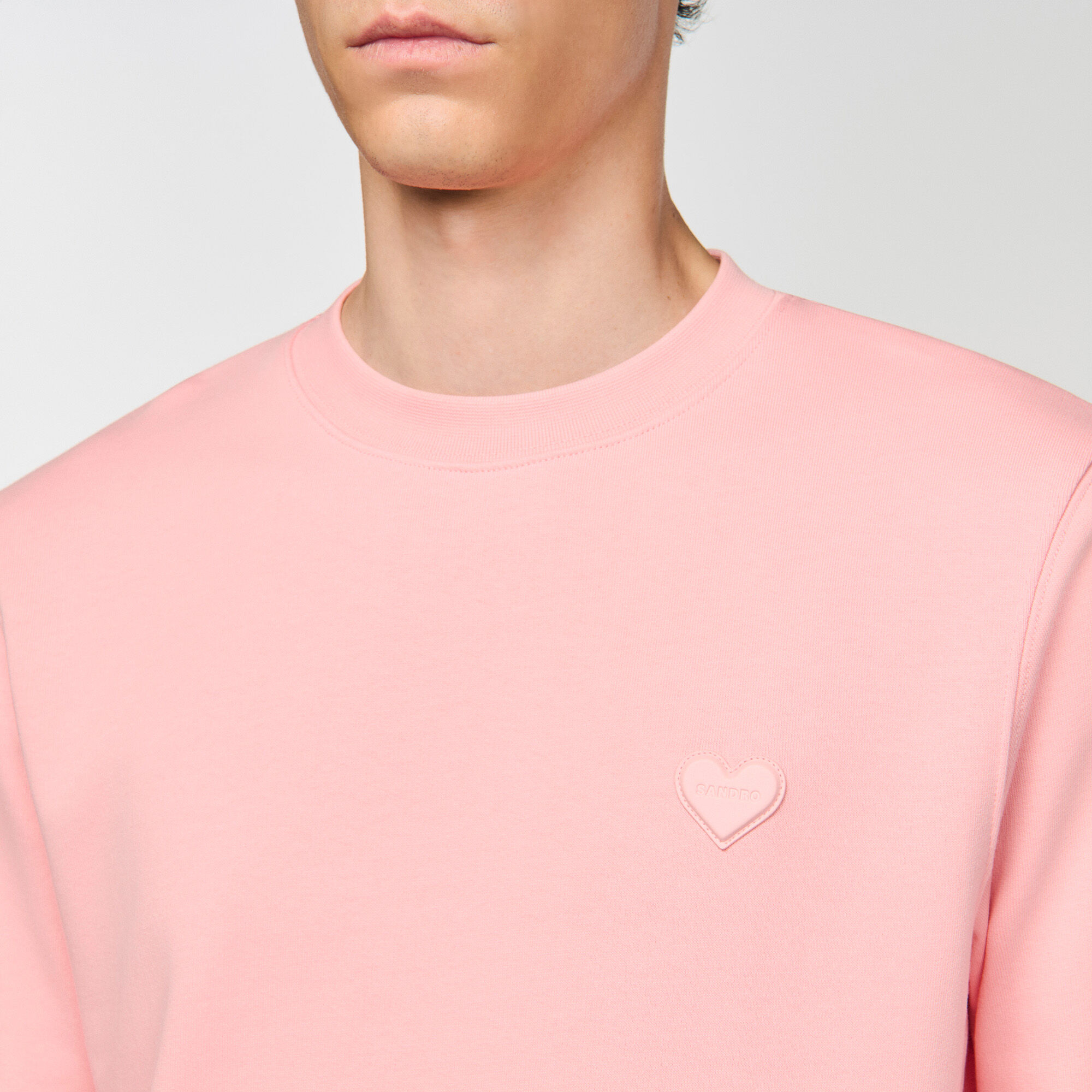 Felpa con cerniera a cuore