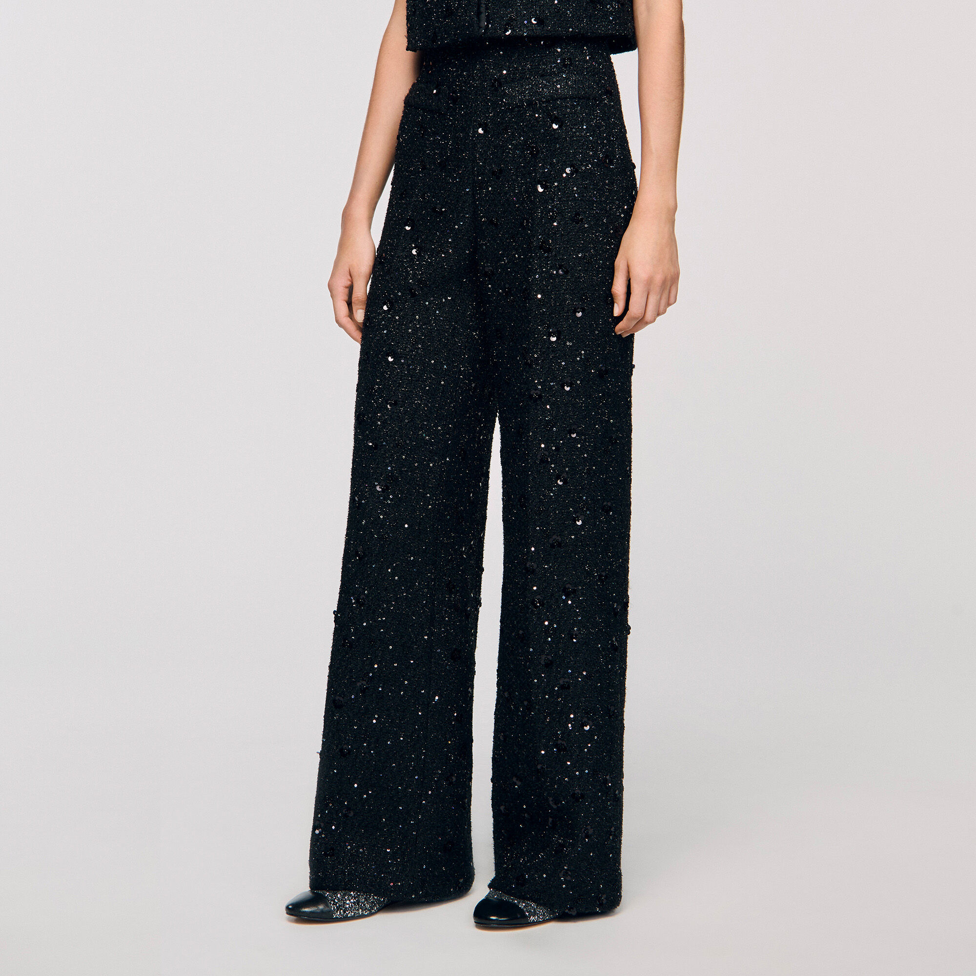 Pantaloni in tessuto tweed con strass