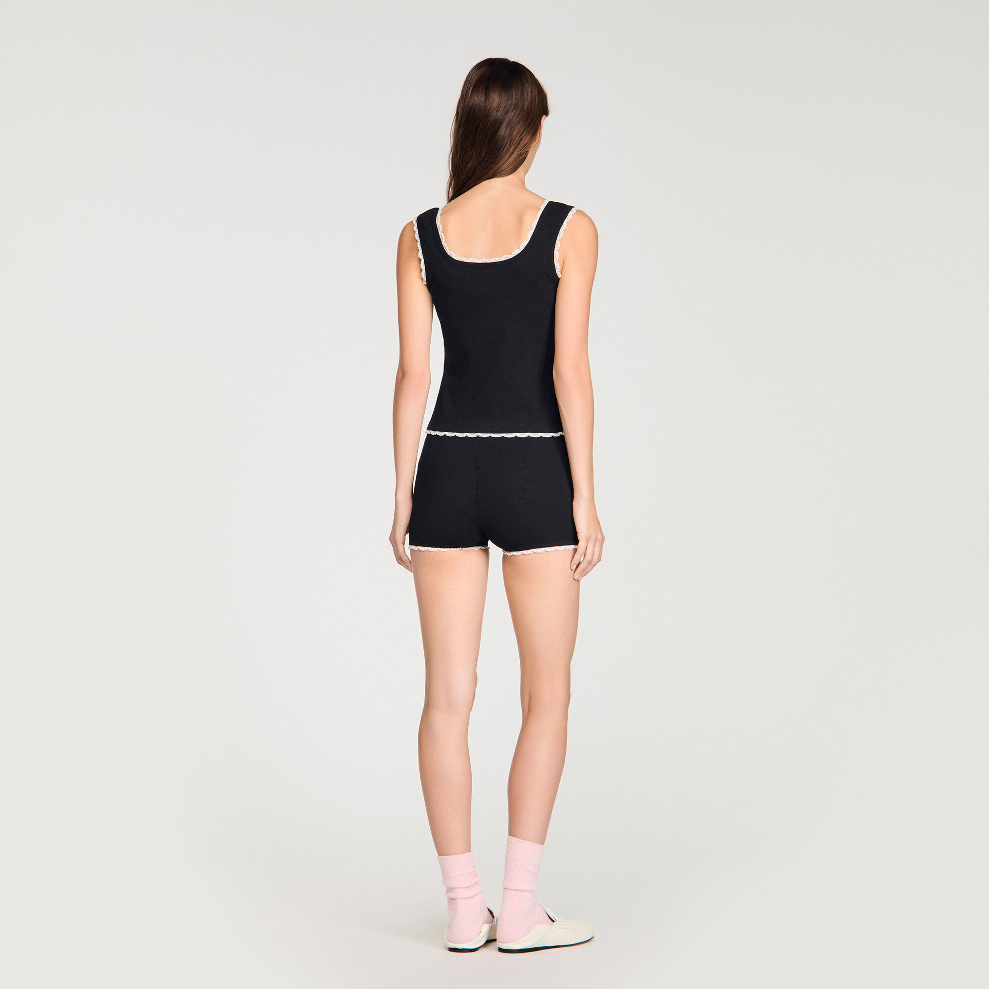 Top in cotone ricamato con perline