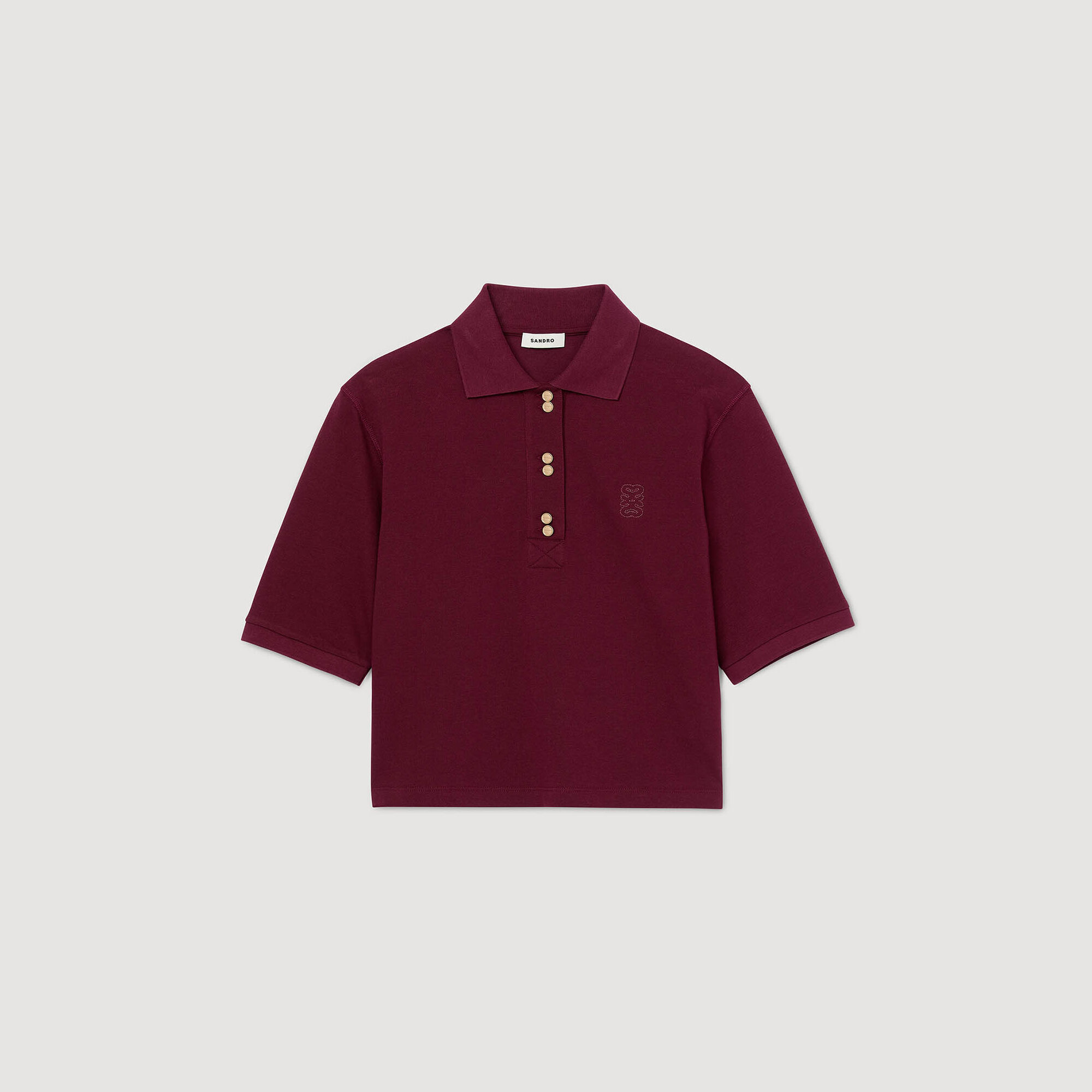 Maglietta polo con bottoni decorativi